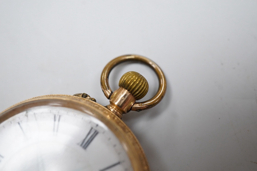 A lady's early 20th century 14K open faced fob watch, with Roman dial and gilt metal dust cover, gross weight 36 grams (dial cracked).